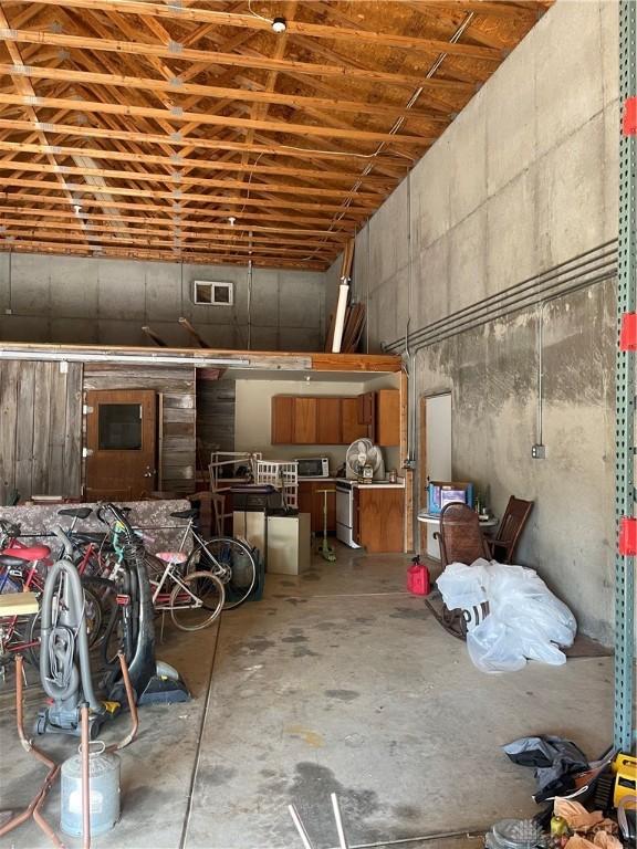 3862 Robinson Vail Rd, Franklin, OH 45005 - miscellaneous room with unfinished concrete flooring and a garage
