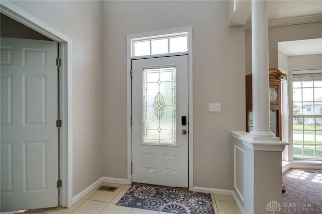 3334 Greycliff Trl, Franklin Twp, OH 45005 - foyer with decorative columns, plenty of natural light, and light tile patterned floors
