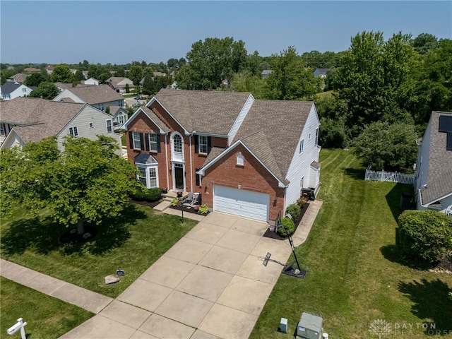 3334 Greycliff Trl, Franklin Twp, OH 45005 - traditional-style home with brick siding, concrete driveway, and an attached garage