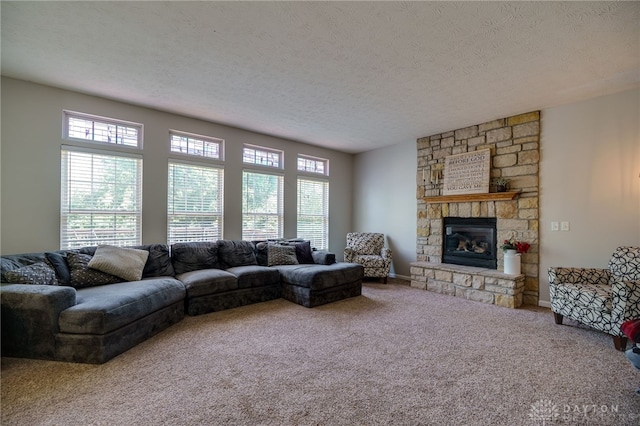 3334 Greycliff Trl, Franklin Twp, OH 45005 - carpeted living room with a stone fireplace and a textured ceiling