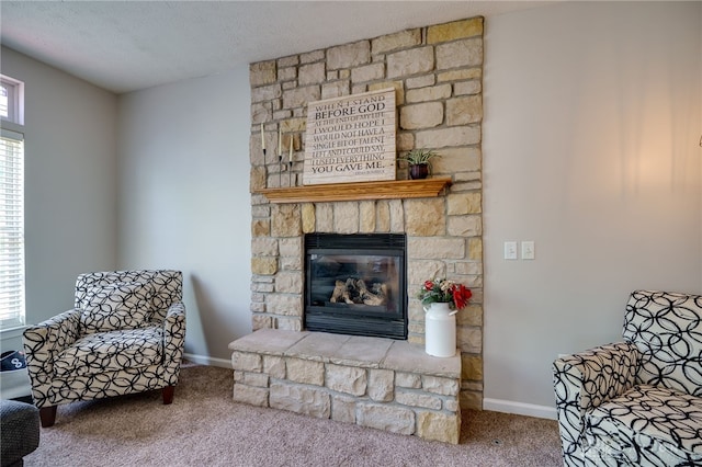 3334 Greycliff Trl, Franklin Twp, OH 45005 - carpeted living area with a stone fireplace, healthy amount of natural light, and a textured ceiling