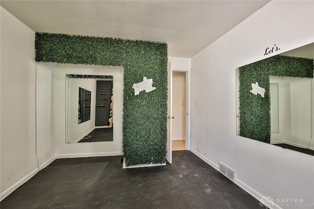 4108 Central Ave, Middletown, OH 45044 - spare room featuring baseboards and concrete flooring