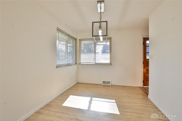 4108 Central Ave, Middletown, OH 45044 - unfurnished dining area with light wood-style floors and baseboards