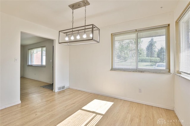 4108 Central Ave, Middletown, OH 45044 - unfurnished dining area with wood finished floors and baseboards
