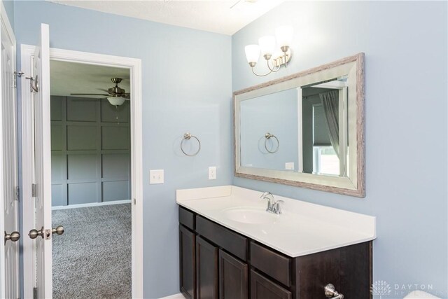 133 Followers Way, Waynesville, OH 45068 - bathroom featuring vanity, a ceiling fan, and a chandelier