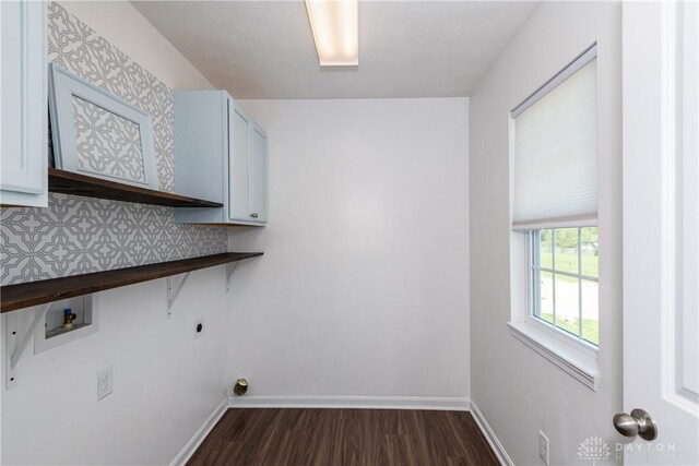 133 Followers Way, Waynesville, OH 45068 - laundry area featuring cabinet space, dark wood-type flooring, hookup for a washing machine, and electric dryer hookup
