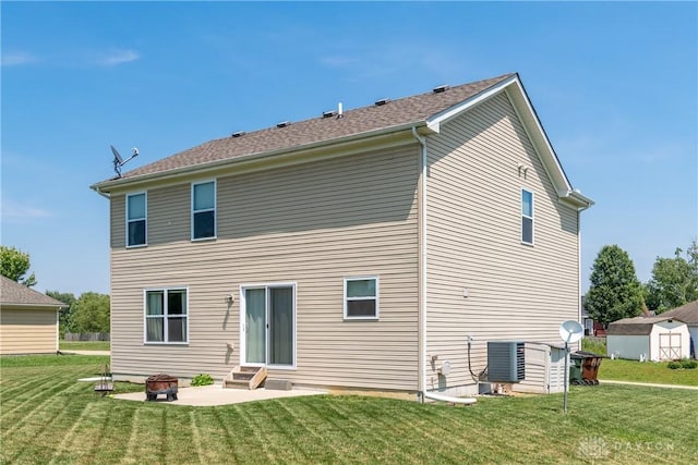 133 Followers Way, Waynesville, OH 45068 - rear view of house with a yard, entry steps, a patio, a shed, and a fire pit
