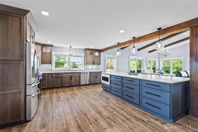 1737 Wilmington Rd, Cedarville Twp, OH 45314 - kitchen featuring stainless steel appliances, backsplash, light wood finished floors, recessed lighting, and light countertops