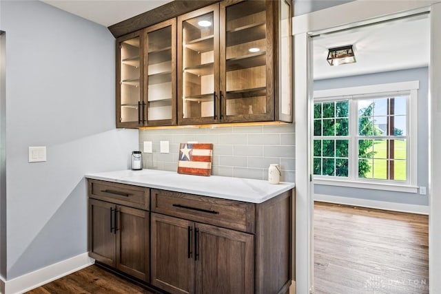 1737 Wilmington Rd, Cedarville Twp, OH 45314 - bar area featuring dark wood finished floors and backsplash