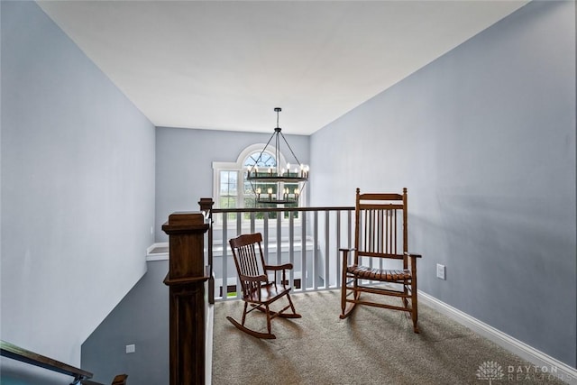 1737 Wilmington Rd, Cedarville Twp, OH 45314 - sitting room with an upstairs landing, a chandelier, and carpet flooring