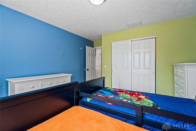 1737 Wilmington Rd, Cedarville Twp, OH 45314 - bedroom with a closet and a textured ceiling