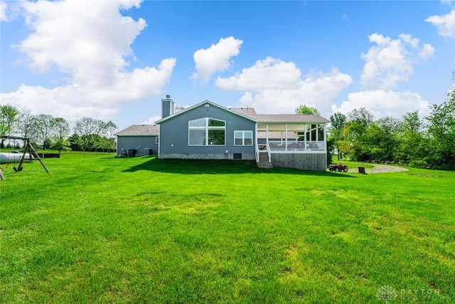 1737 Wilmington Rd, Cedarville Twp, OH 45314 - rear view of house featuring a yard and a chimney