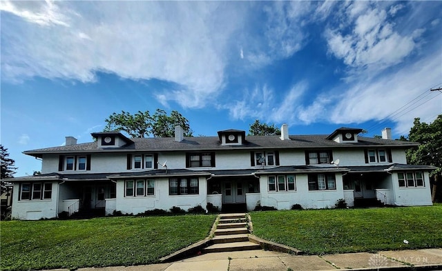 953 Five Oaks Ave Unit 943, Dayton, OH 45406 - view of front of house with french doors, a chimney, a front yard, and stucco siding
