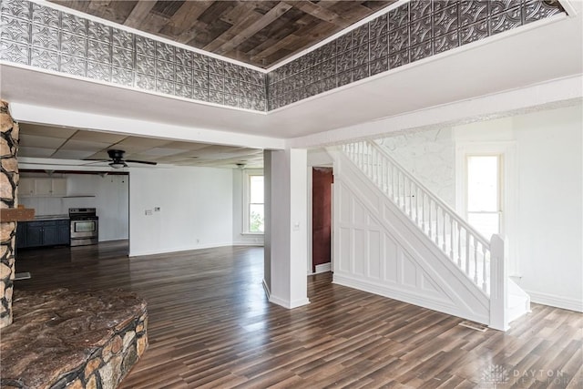 2241 E 3rd St, Dayton, OH 45403 - unfurnished living room with stairs, a ceiling fan, and wood finished floors