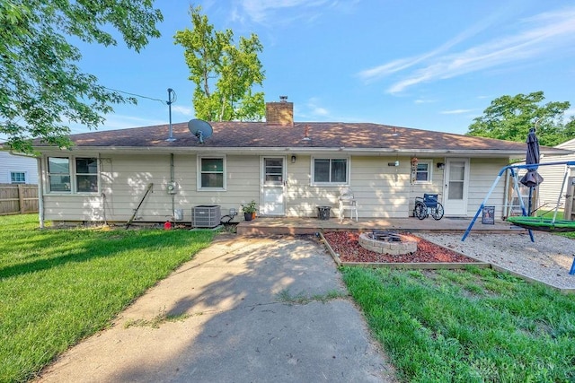 1210 Clovernook Dr, Hamilton, OH 45013 - back of house with an outdoor fire pit, a chimney, and a patio