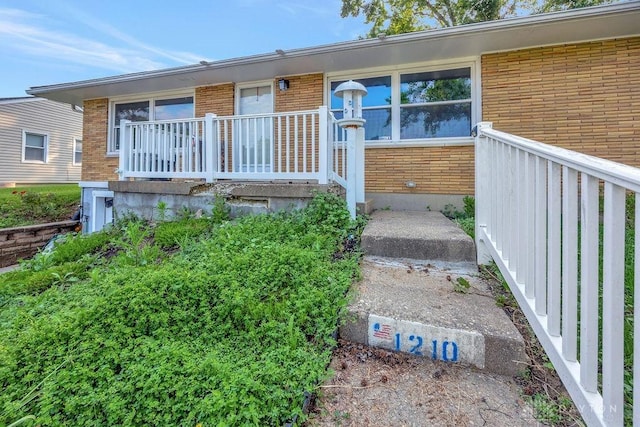 1210 Clovernook Dr, Hamilton, OH 45013 - view of exterior entry featuring brick siding
