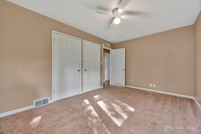 1210 Clovernook Dr, Hamilton, OH 45013 - unfurnished bedroom featuring carpet and ceiling fan