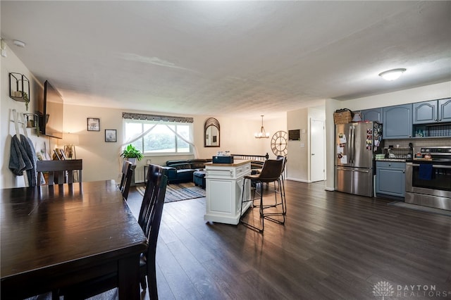 10452 S Union Rd, Miamisburg, OH 45342 - dining space with a chandelier and dark wood-style floors