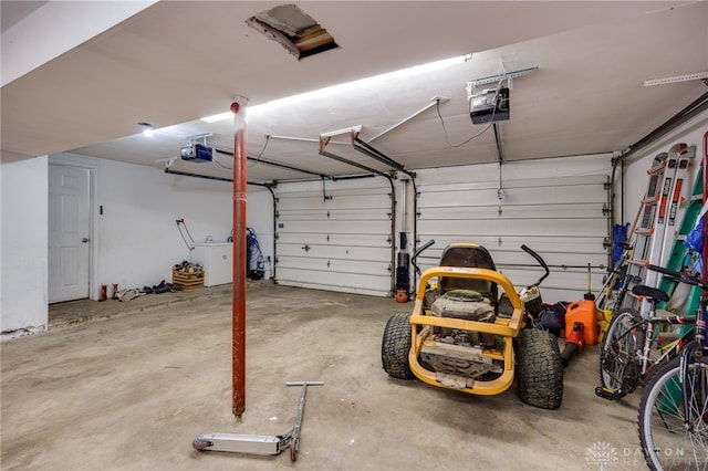 10452 S Union Rd, Miamisburg, OH 45342 - garage with a garage door opener and washer / clothes dryer