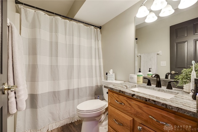 243 Woodside Trl, Clearcreek Twp, OH 45036 - bathroom with vanity, a chandelier, wood finished floors, and a shower with shower curtain