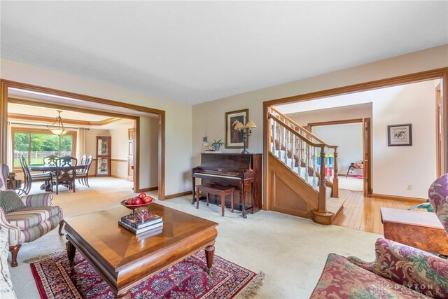 3875 Ferry Rd, Sugarcreek Twp, OH 45305 - living area with light colored carpet and stairway