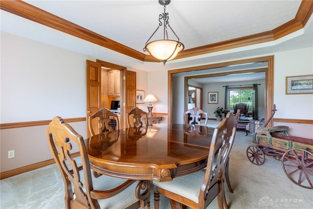 3875 Ferry Rd, Sugarcreek Twp, OH 45305 - dining area with light colored carpet, ornamental molding, and a tray ceiling
