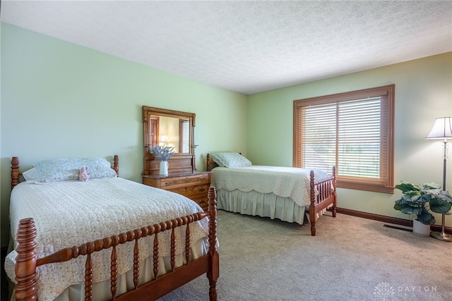 3875 Ferry Rd, Sugarcreek Twp, OH 45305 - bedroom with light colored carpet and a textured ceiling