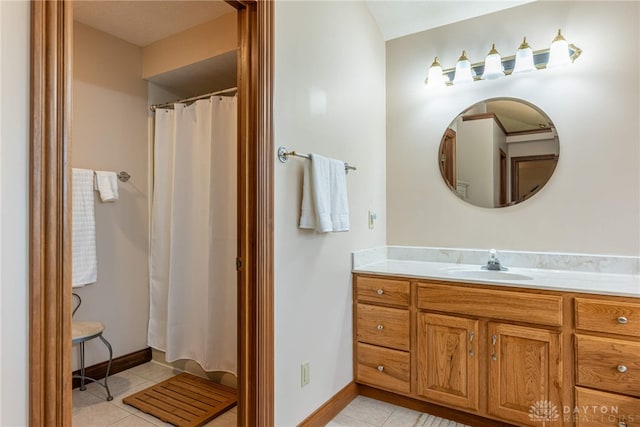 3875 Ferry Rd, Sugarcreek Twp, OH 45305 - full bath featuring tile patterned floors, vanity, and a shower with curtain