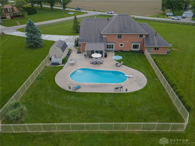 3875 Ferry Rd, Sugarcreek Twp, OH 45305 - view of pool with a fenced backyard, a patio area, outdoor dining space, and a diving board