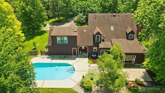 7255 State Route 48, Springboro, OH 45066 - back of house with a patio area, an outdoor pool, and a shingled roof