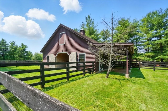 7255 State Route 48, Springboro, OH 45066 - view of property exterior with a chimney, an exterior structure, and an outdoor structure