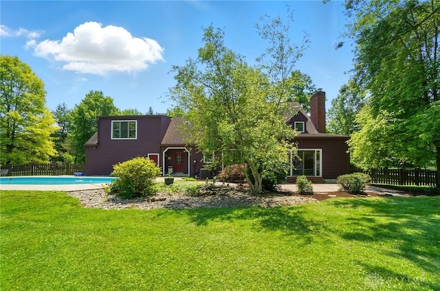 7255 State Route 48, Springboro, OH 45066 - back of property with a chimney and a patio area