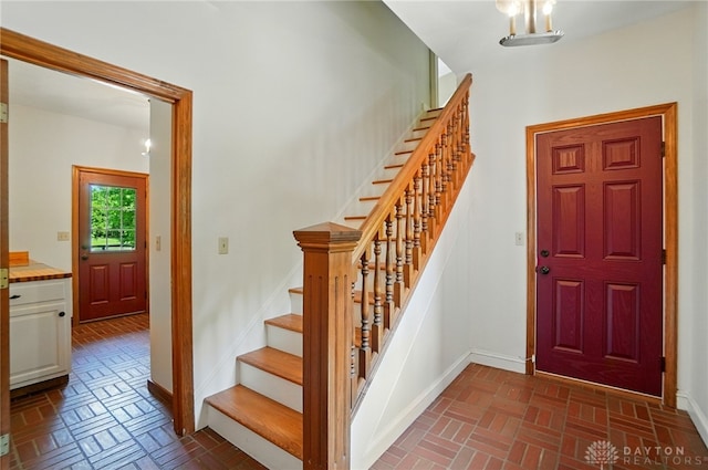 7255 State Route 48, Springboro, OH 45066 - foyer with brick patterned floors and stairs