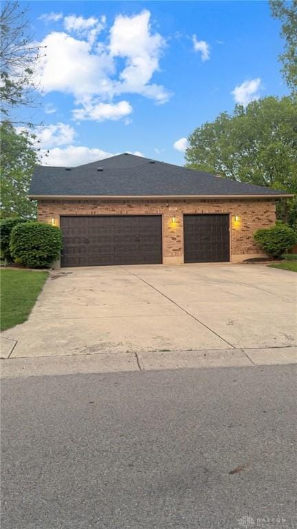 7171 Dominican Dr, Clayton, OH 45415 - view of front of home with concrete driveway and a garage