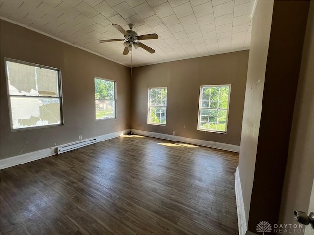 211 W 70th St, Cincinnati, OH 45216 - unfurnished room featuring baseboard heating, healthy amount of natural light, ornamental molding, dark wood-style floors, and ceiling fan