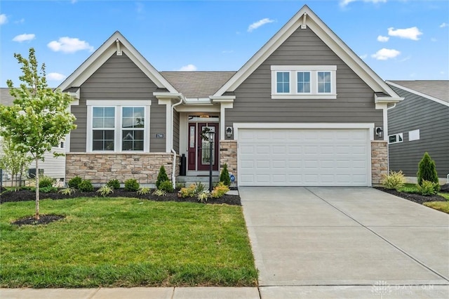 1796 Archerfield Pl, Miamisburg, OH 45342 - craftsman-style house featuring stone siding, a front yard, driveway, and an attached garage