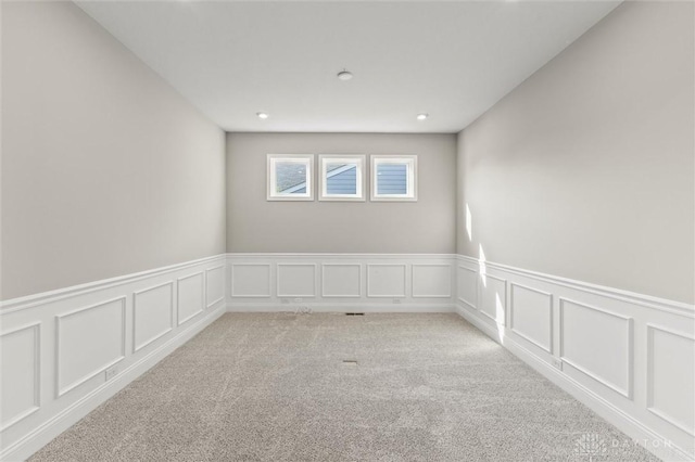 1796 Archerfield Pl, Miamisburg, OH 45342 - unfurnished room featuring a decorative wall, wainscoting, light colored carpet, and recessed lighting