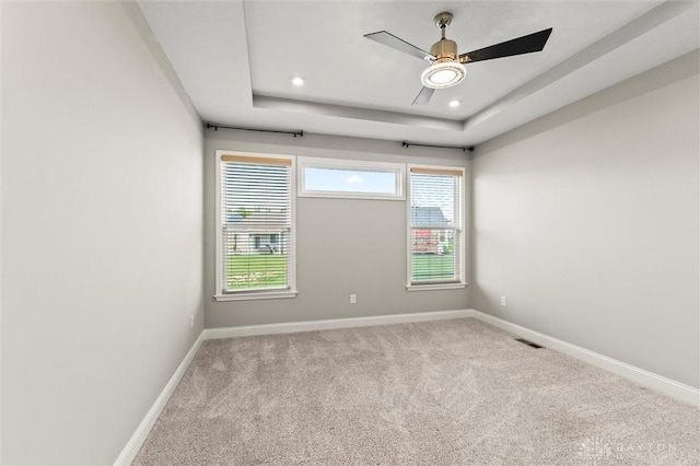 1796 Archerfield Pl, Miamisburg, OH 45342 - carpeted empty room featuring a ceiling fan, recessed lighting, and a tray ceiling