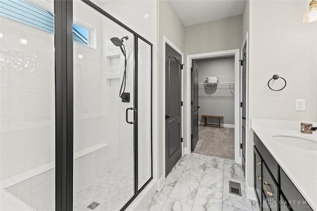 1796 Archerfield Pl, Miamisburg, OH 45342 - bathroom with a stall shower, a walk in closet, vanity, and marble look tile flooring