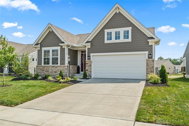 1796 Archerfield Pl, Miamisburg, OH 45342 - craftsman-style home featuring stone siding, concrete driveway, a front lawn, and an attached garage