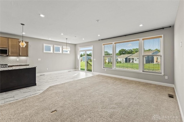 1796 Archerfield Pl, Miamisburg, OH 45342 - unfurnished living room with recessed lighting and baseboards