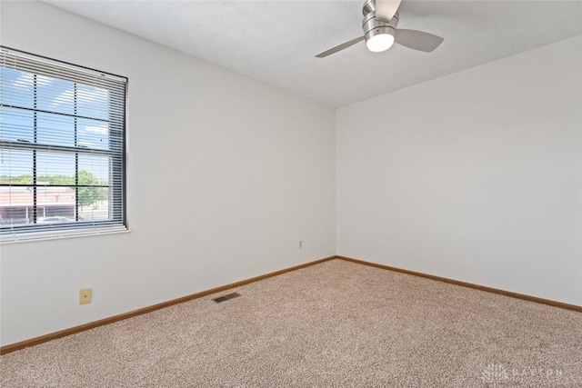 7607 Paragon Commons Cir, Dayton, OH 45459 - carpeted spare room with baseboards and a ceiling fan