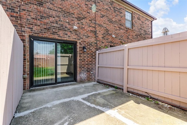 7607 Paragon Commons Cir, Dayton, OH 45459 - property entrance with brick siding and a patio