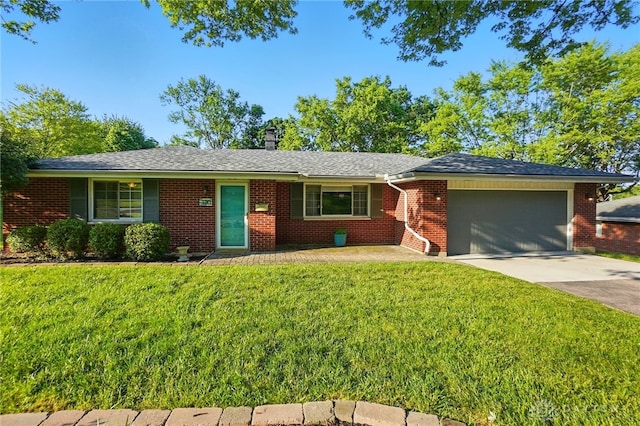 320 Witherby Dr, Kettering, OH 45429 - ranch-style home with a garage, a front lawn, concrete driveway, and brick siding