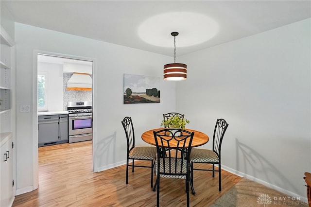 320 Witherby Dr, Kettering, OH 45429 - dining room with light wood-style flooring