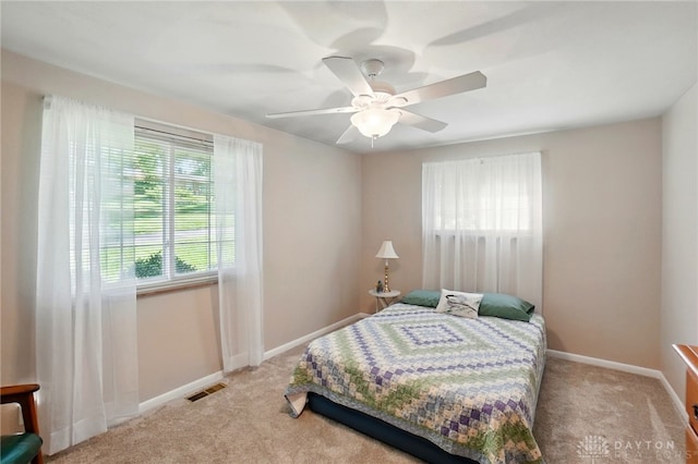 320 Witherby Dr, Kettering, OH 45429 - carpeted bedroom with baseboards and a ceiling fan