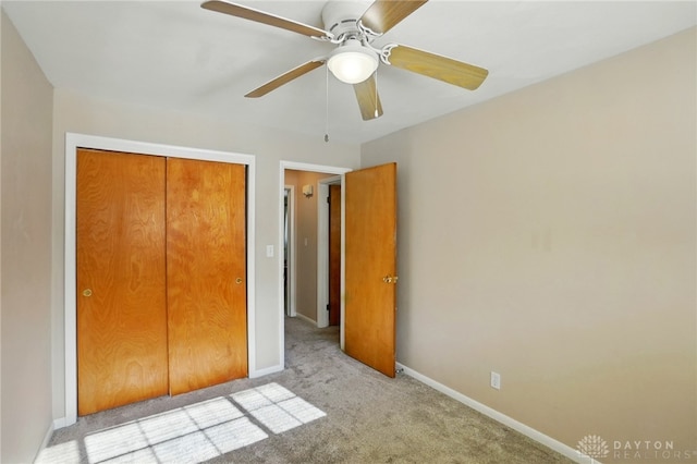 320 Witherby Dr, Kettering, OH 45429 - unfurnished bedroom with light colored carpet, a closet, and a ceiling fan