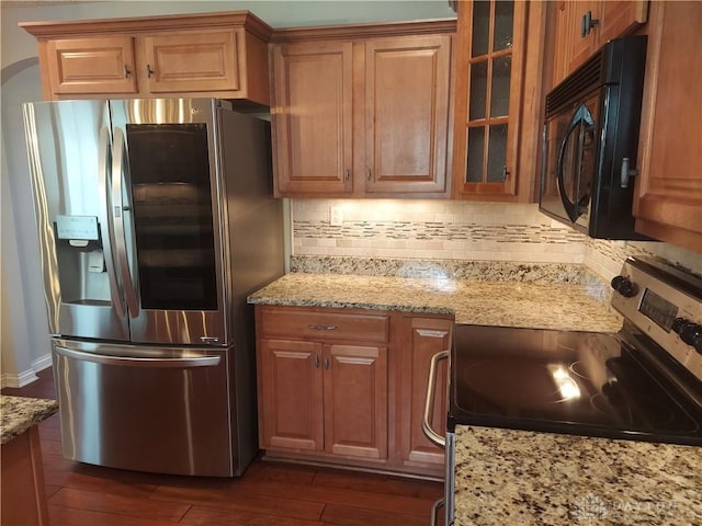 1052 Windpointe Way, Englewood, OH 45322 - kitchen featuring stainless steel appliances, tasteful backsplash, dark wood-type flooring, glass insert cabinets, and brown cabinets