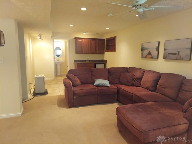 1052 Windpointe Way, Englewood, OH 45322 - living area with ceiling fan, light colored carpet, and recessed lighting