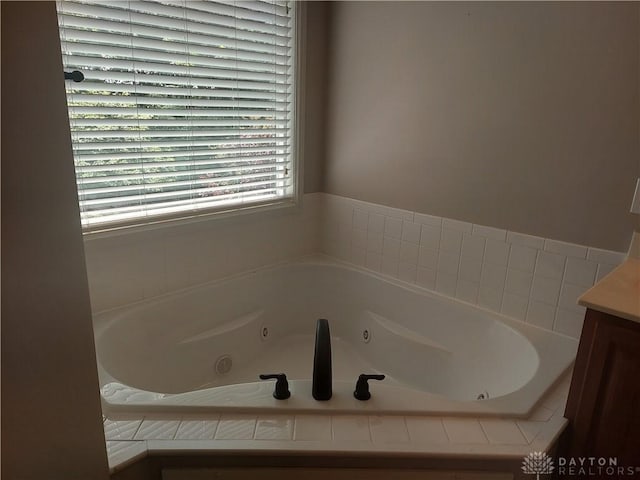 1052 Windpointe Way, Englewood, OH 45322 - full bath with a tub with jets and vanity